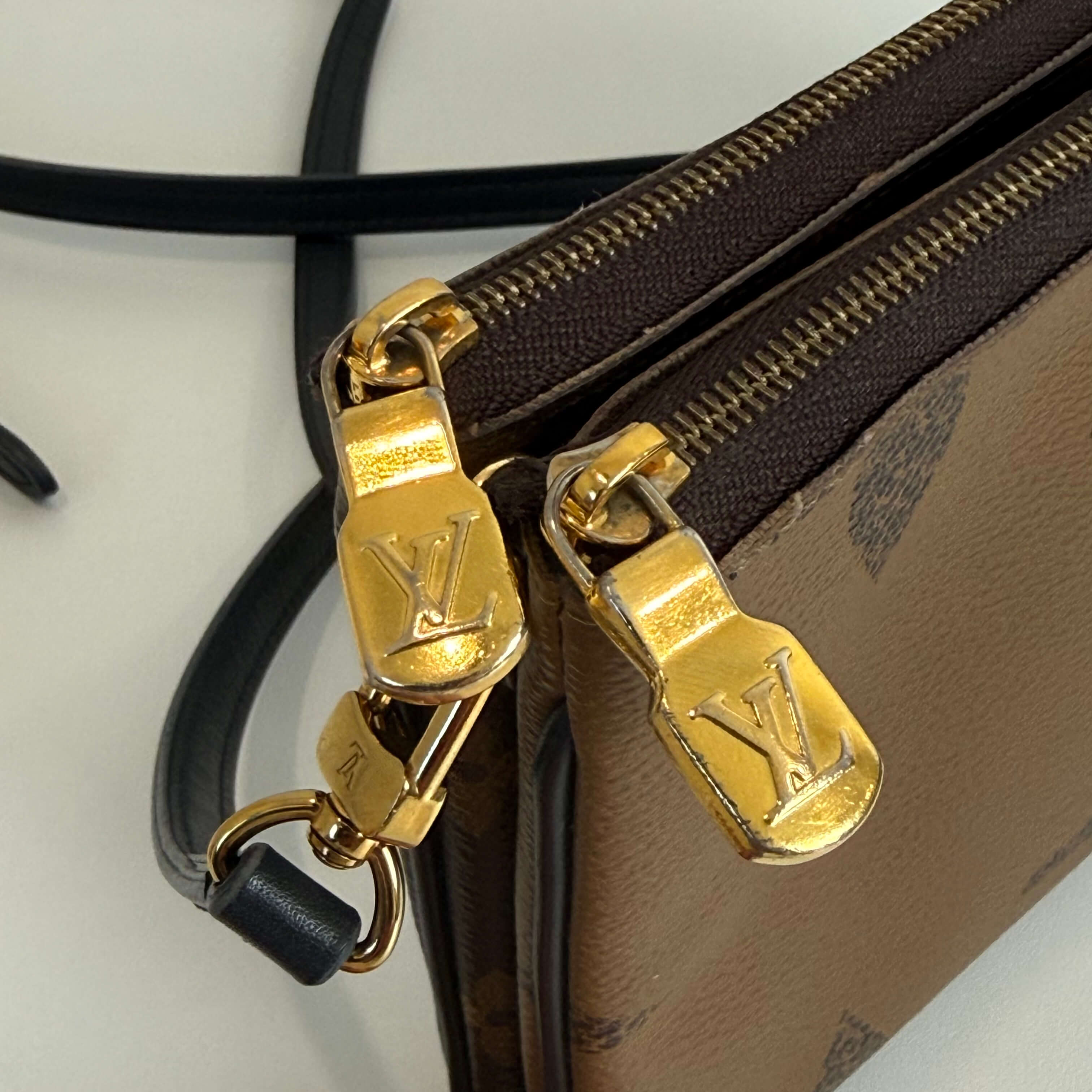 Reverse Monogram Double Zip Pochette