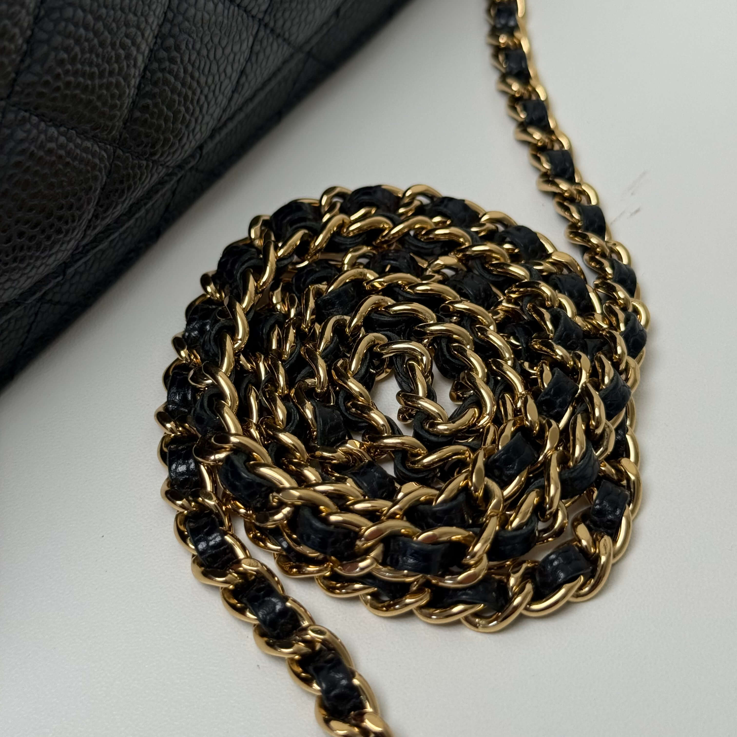WOC Caviar Leather